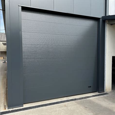 Vente en ligne de portes de garage sectionnelle sur mesure